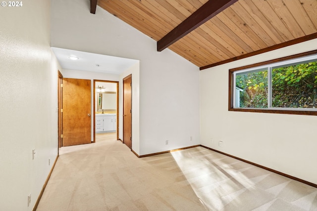 39145 Eagles Rest Rd, Dexter, OR 97431 - unfurnished room with a sink, light carpet, wood ceiling, baseboards, and vaulted ceiling with beams