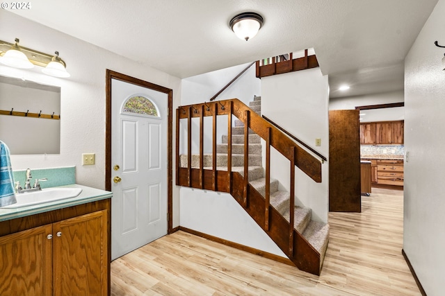 39145 Eagles Rest Rd, Dexter, OR 97431 - interior space with baseboards, light wood-style floors, and stairway