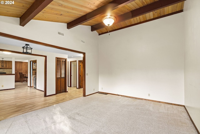 39145 Eagles Rest Rd, Dexter, OR 97431 - spare room with light carpet, wooden ceiling, visible vents, and vaulted ceiling with beams