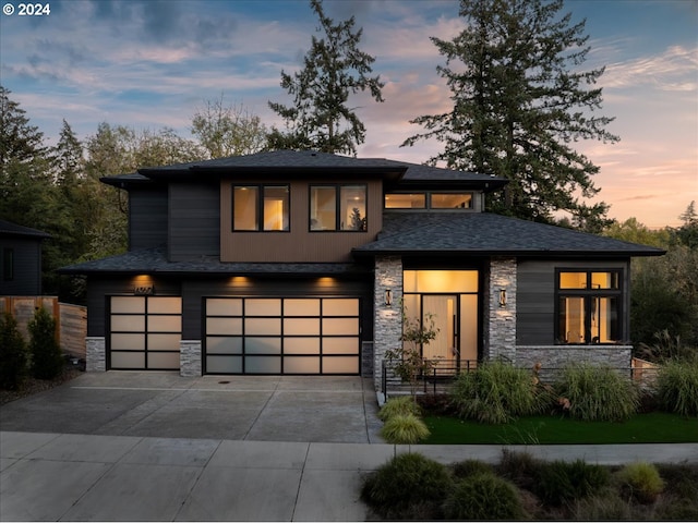 prairie-style home featuring a garage