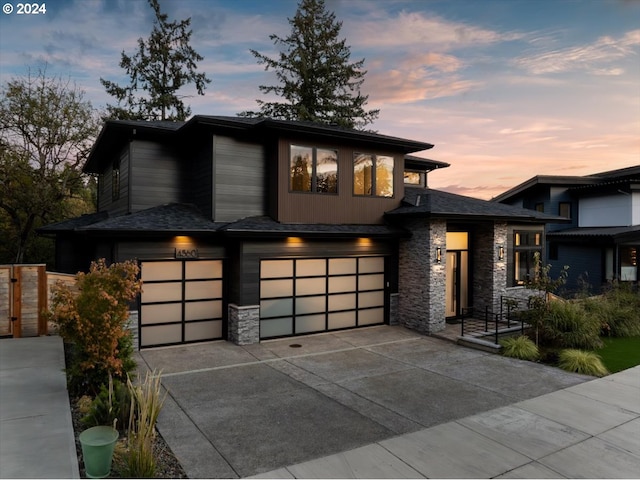 prairie-style home featuring a garage