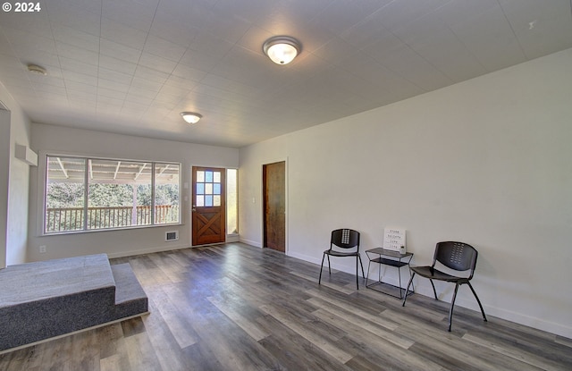 living area with wood-type flooring