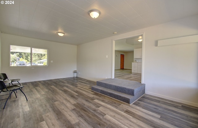 unfurnished room with hardwood / wood-style floors