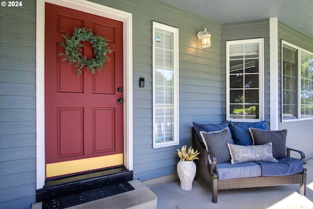 doorway to property with a porch