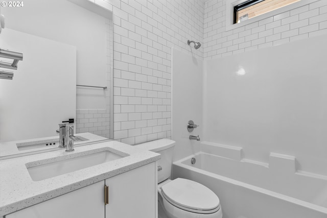 full bathroom featuring vanity, toilet, and bathtub / shower combination