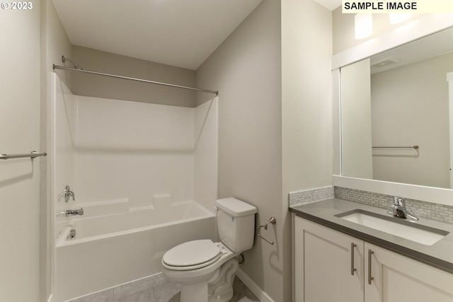 full bathroom featuring vanity, backsplash, tile patterned flooring, toilet, and shower / bath combination