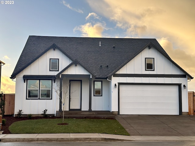 modern farmhouse with a yard