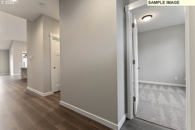 hall featuring dark hardwood / wood-style floors