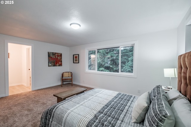 bedroom with light carpet