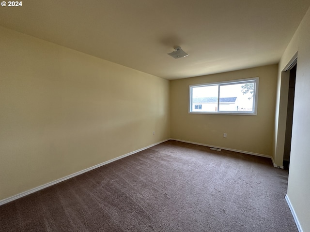 empty room featuring carpet