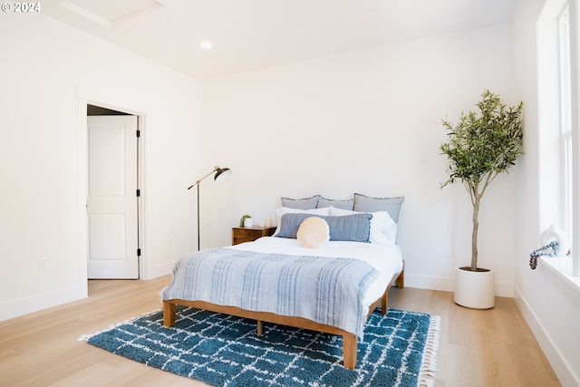 bedroom featuring hardwood / wood-style floors