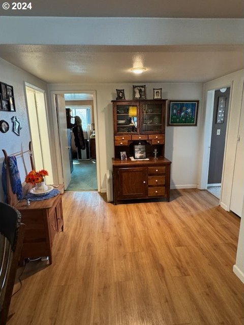 dining space with light hardwood / wood-style flooring