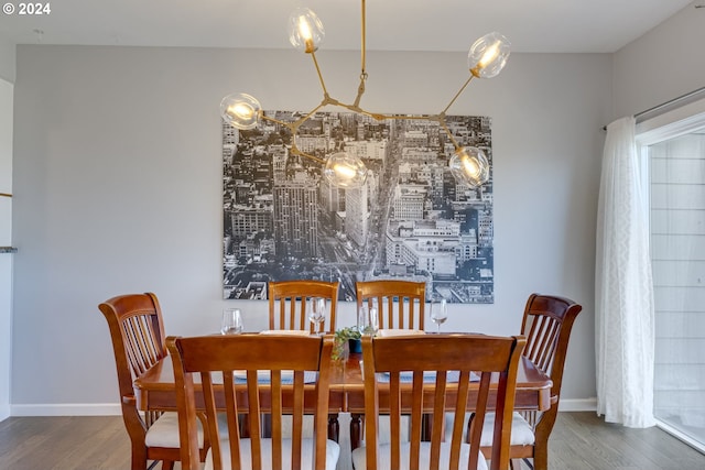 dining space featuring hardwood / wood-style flooring