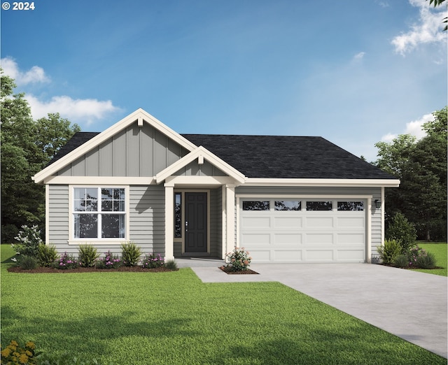 view of front of house with a front lawn and a garage