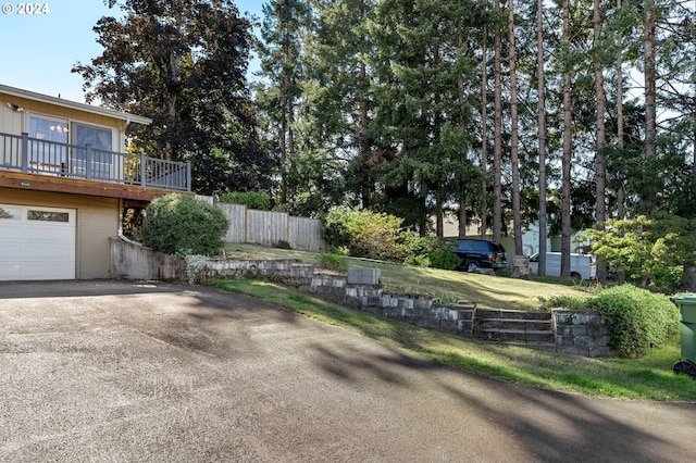 view of yard with a garage