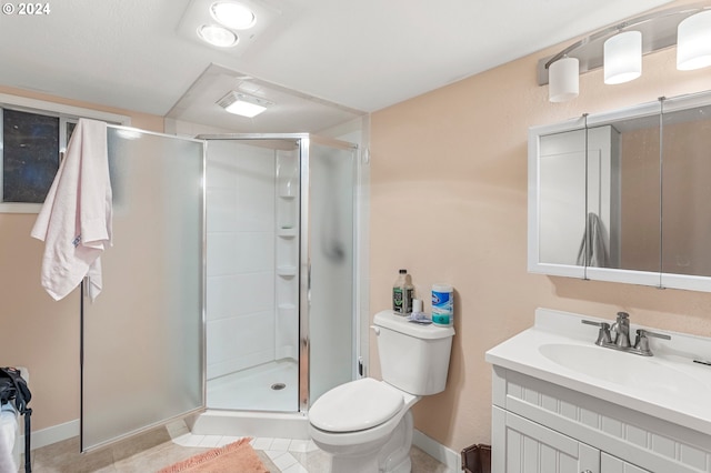 bathroom featuring vanity, toilet, tile patterned floors, and walk in shower