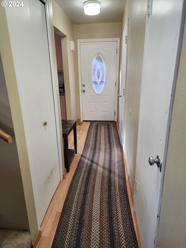 doorway to outside featuring light hardwood / wood-style floors