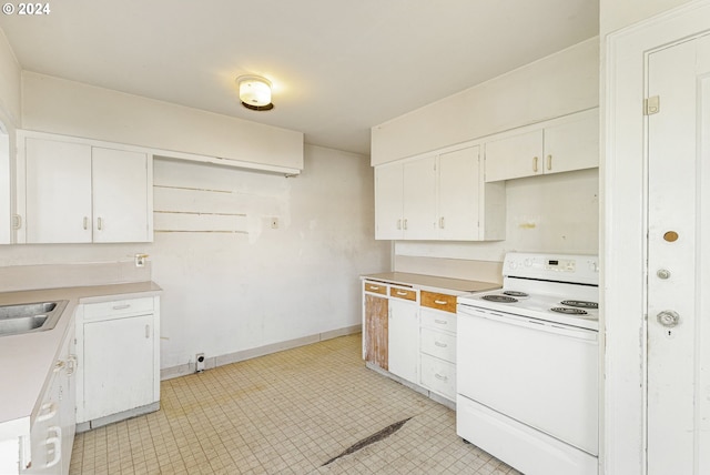 kitchen with white cabinets and white appliances