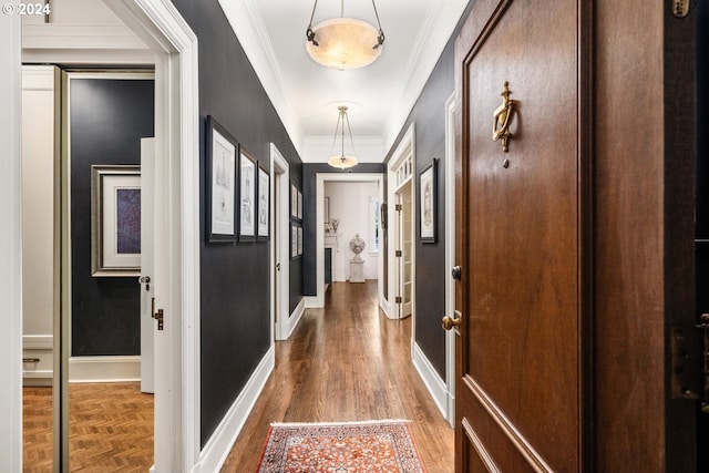 hallway featuring crown molding