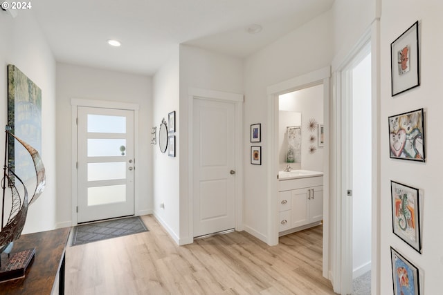 entrance foyer with light hardwood / wood-style floors