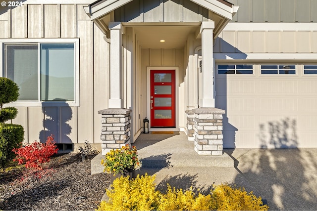 property entrance with a garage