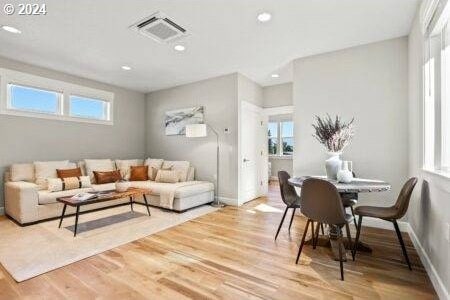 living room featuring light hardwood / wood-style floors