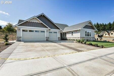 craftsman house with a garage