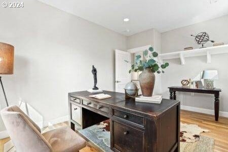 office space featuring light wood-type flooring