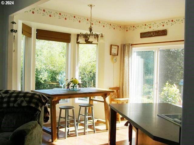 dining room with a notable chandelier