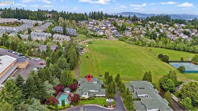 drone / aerial view featuring a mountain view