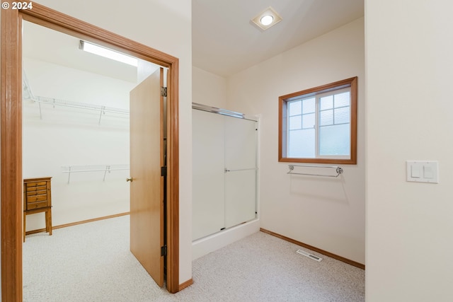 bathroom with walk in shower