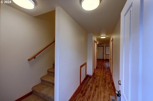 720 G Ave Unit D, Seaside, OR 97138 - hallway with dark wood-style floors and baseboards