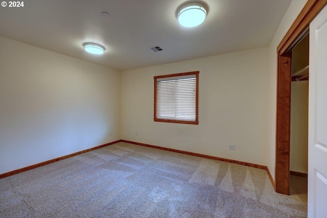 720 G Ave Unit D, Seaside, OR 97138 - unfurnished bedroom featuring light colored carpet and baseboards