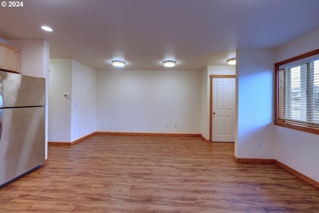 720 G Ave Unit D, Seaside, OR 97138 - unfurnished room with light wood-type flooring, baseboards, and recessed lighting