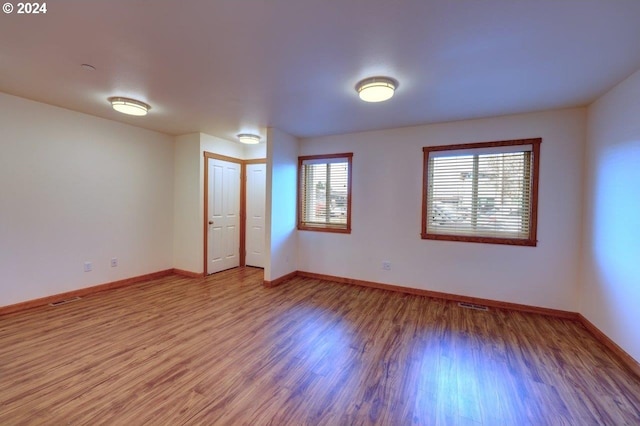 720 G Ave Unit D, Seaside, OR 97138 - spare room with light wood-style floors and baseboards