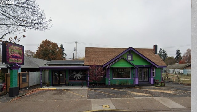 view of front of house featuring uncovered parking