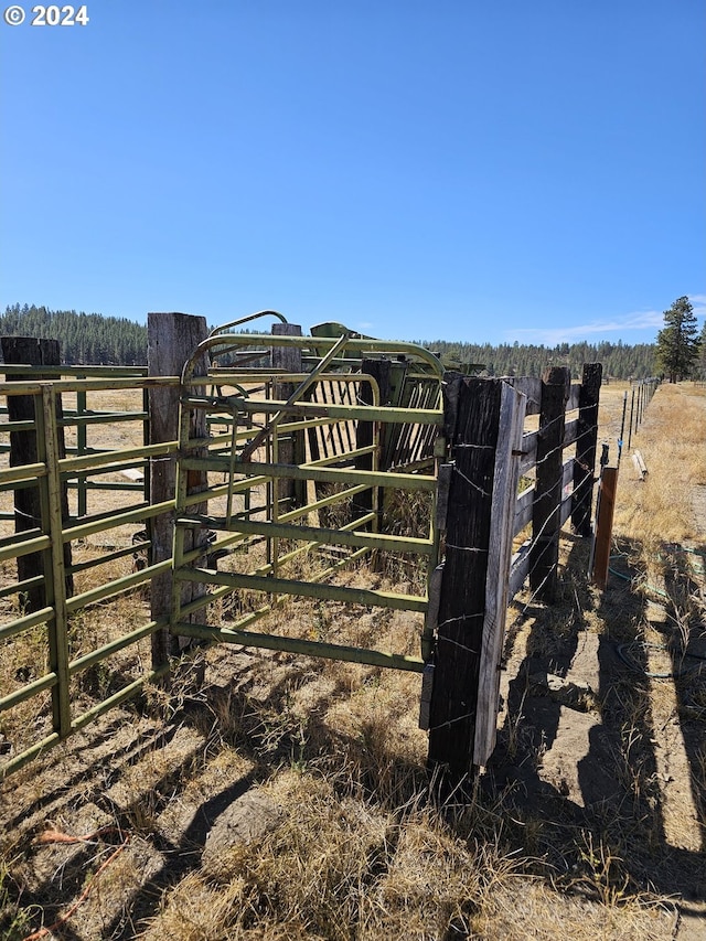 exterior space featuring an outbuilding and a rural view