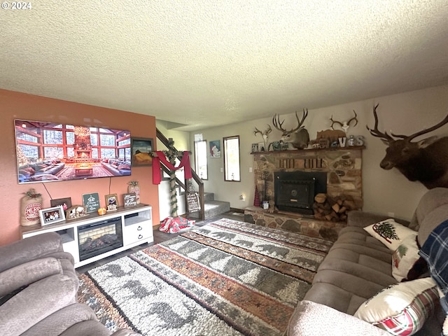 living room with a textured ceiling