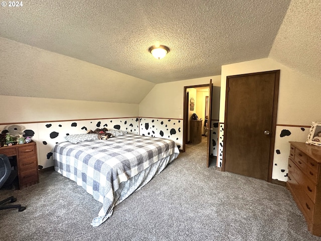 carpeted bedroom featuring a textured ceiling and lofted ceiling