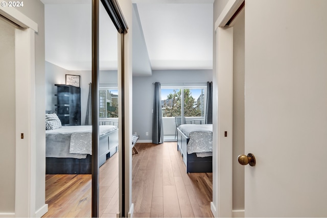 corridor featuring light hardwood / wood-style floors