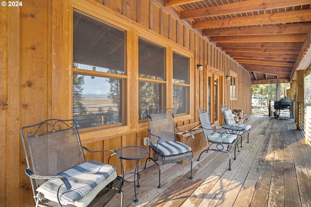 wooden deck with grilling area