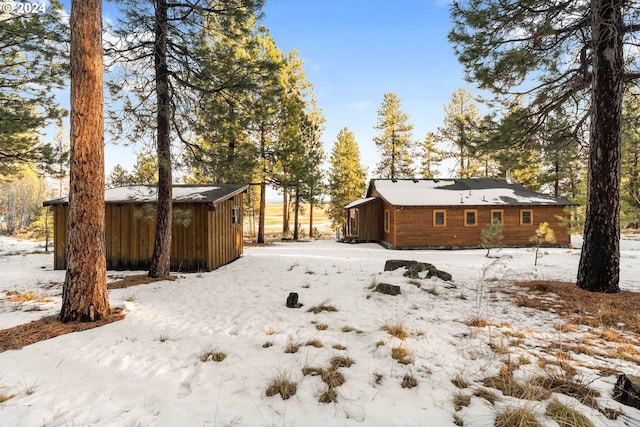 view of yard covered in snow