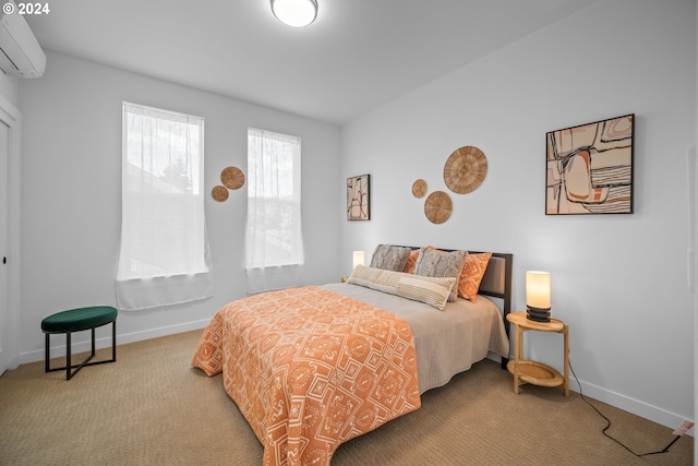 bedroom with carpet and an AC wall unit