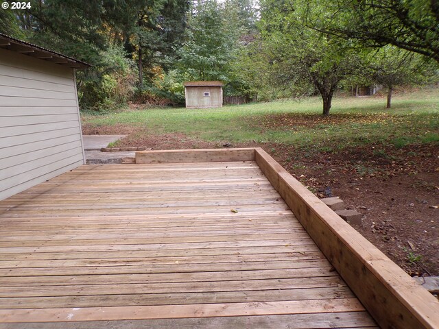 deck featuring a storage shed