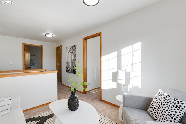 living room with light colored carpet