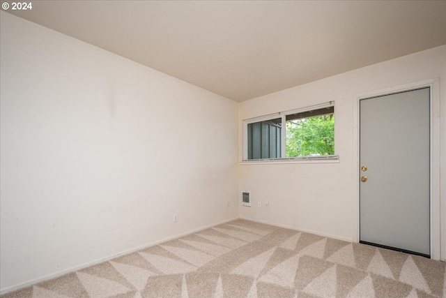 empty room with carpet floors