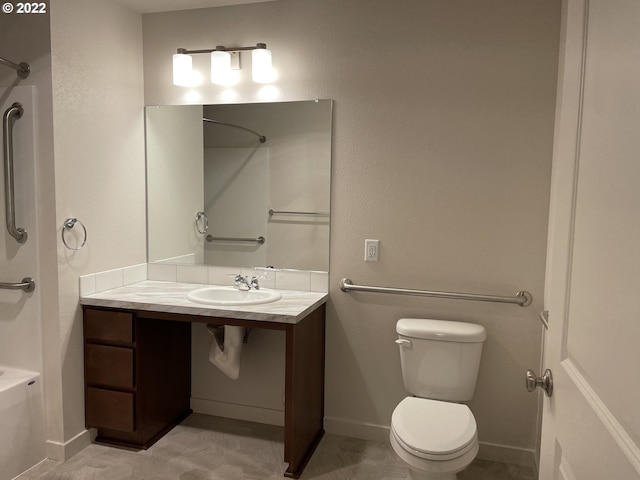 bathroom with toilet and sink