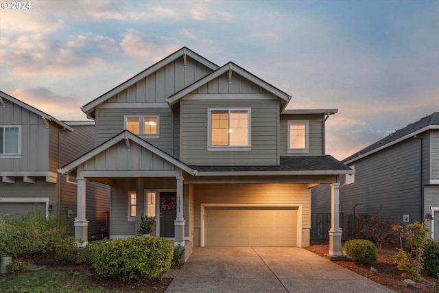 craftsman-style home with a garage