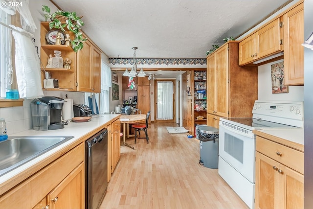 kitchen featuring white electric range oven, hanging light fixtures, sink, light hardwood / wood-style flooring, and black dishwasher