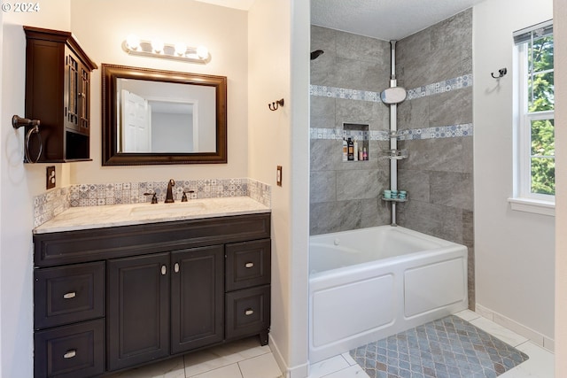 bathroom with separate shower and tub, tile patterned flooring, vanity, and a textured ceiling